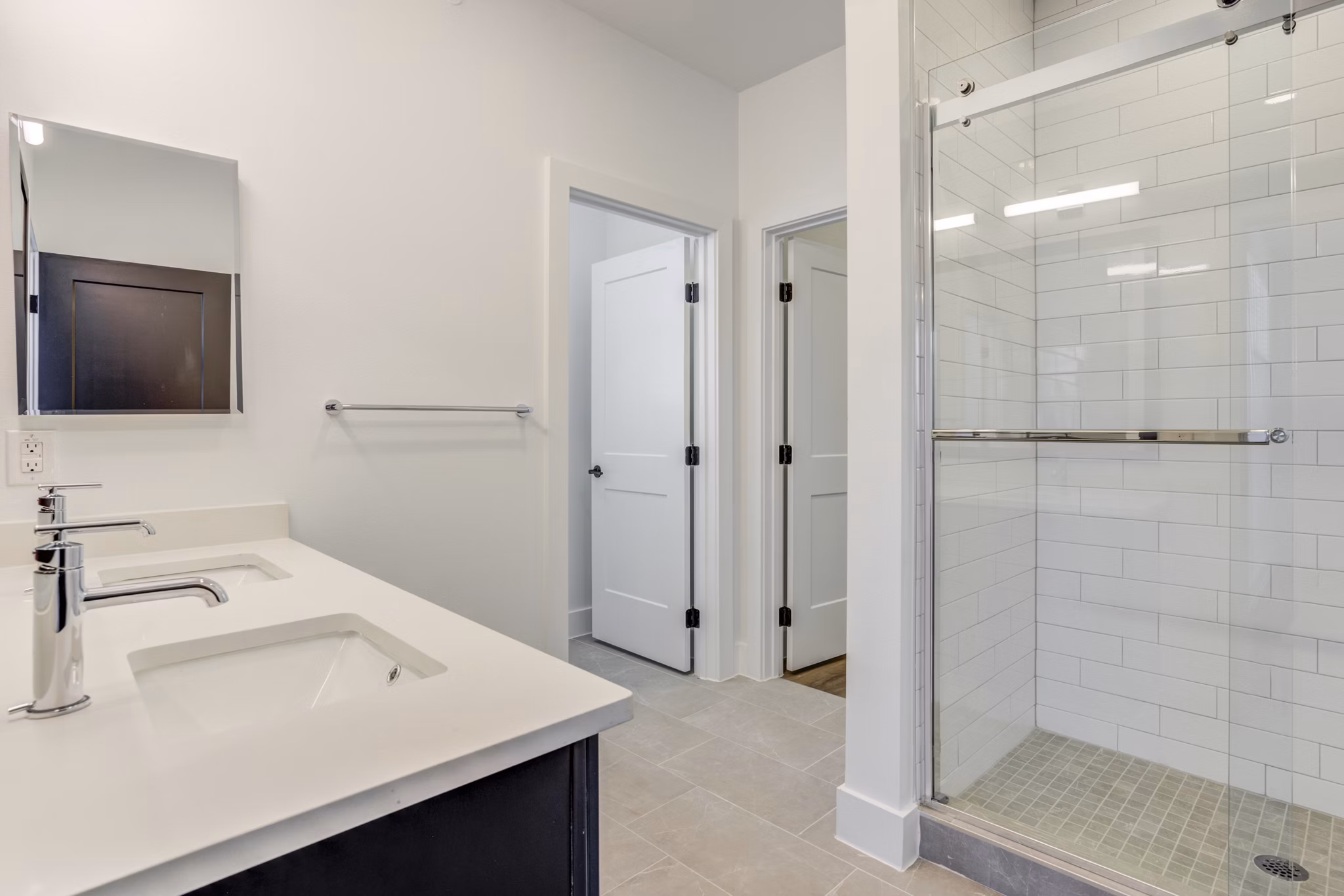 Bathroom with modern fixtures and elegant tiles in Escalon Townhomes Apartments