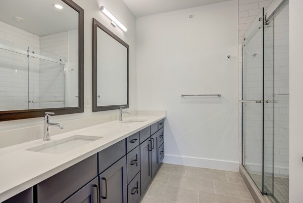 Modern bathroom with sleek fixtures in Escalon Townhomes Apartments, featuring luxury amenities and contemporary design