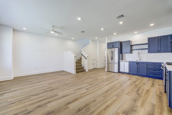 Stylish clubhouse at Escalon Townhomes Apartments featuring modern seating areas and communal spaces