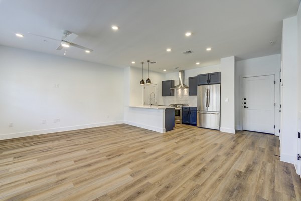 Stylish clubhouse featuring modern lounge areas at Escalon Townhomes Apartments