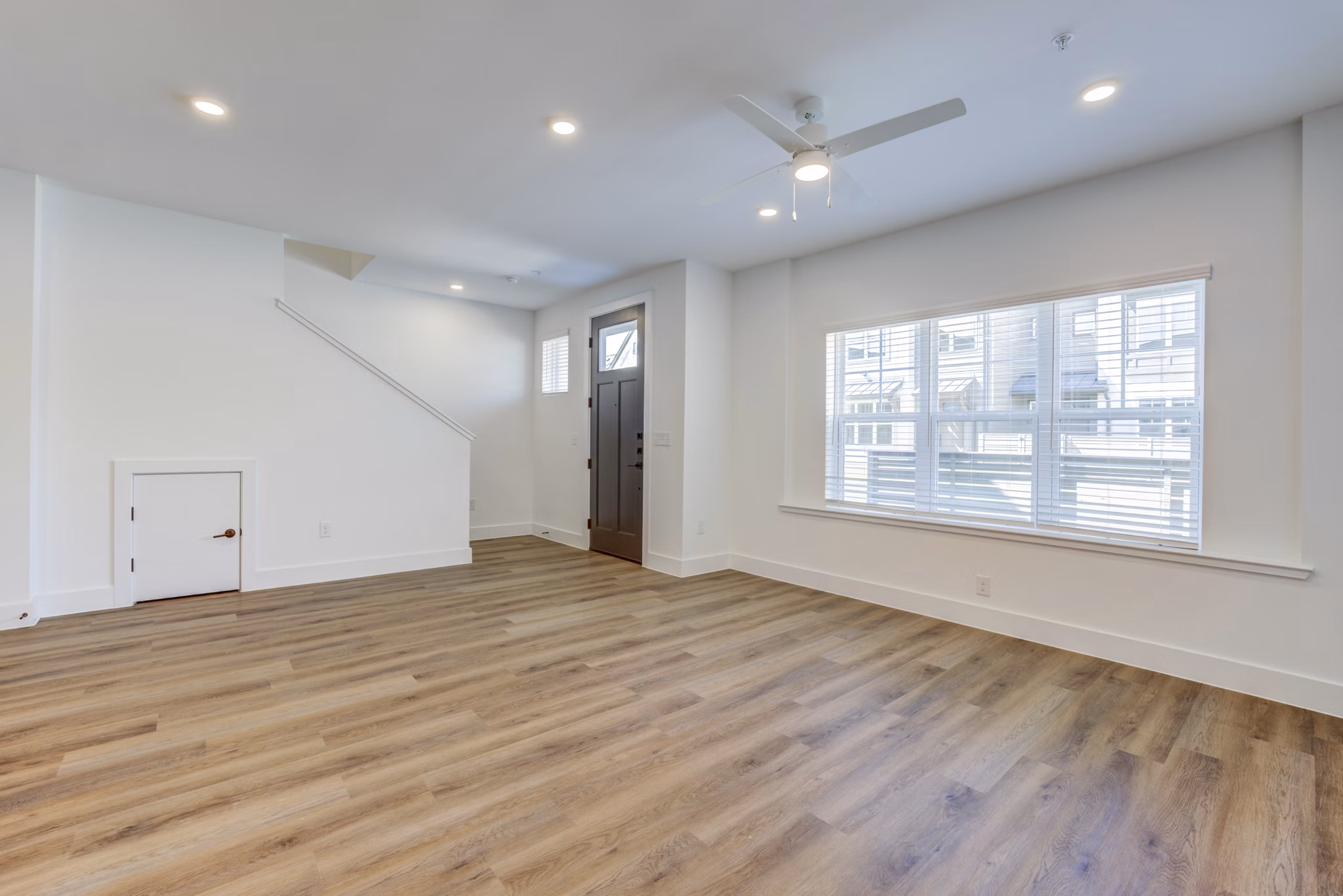 Chic clubhouse with stylish seating and modern decor at Escalon Townhomes Apartments for luxury gatherings and events