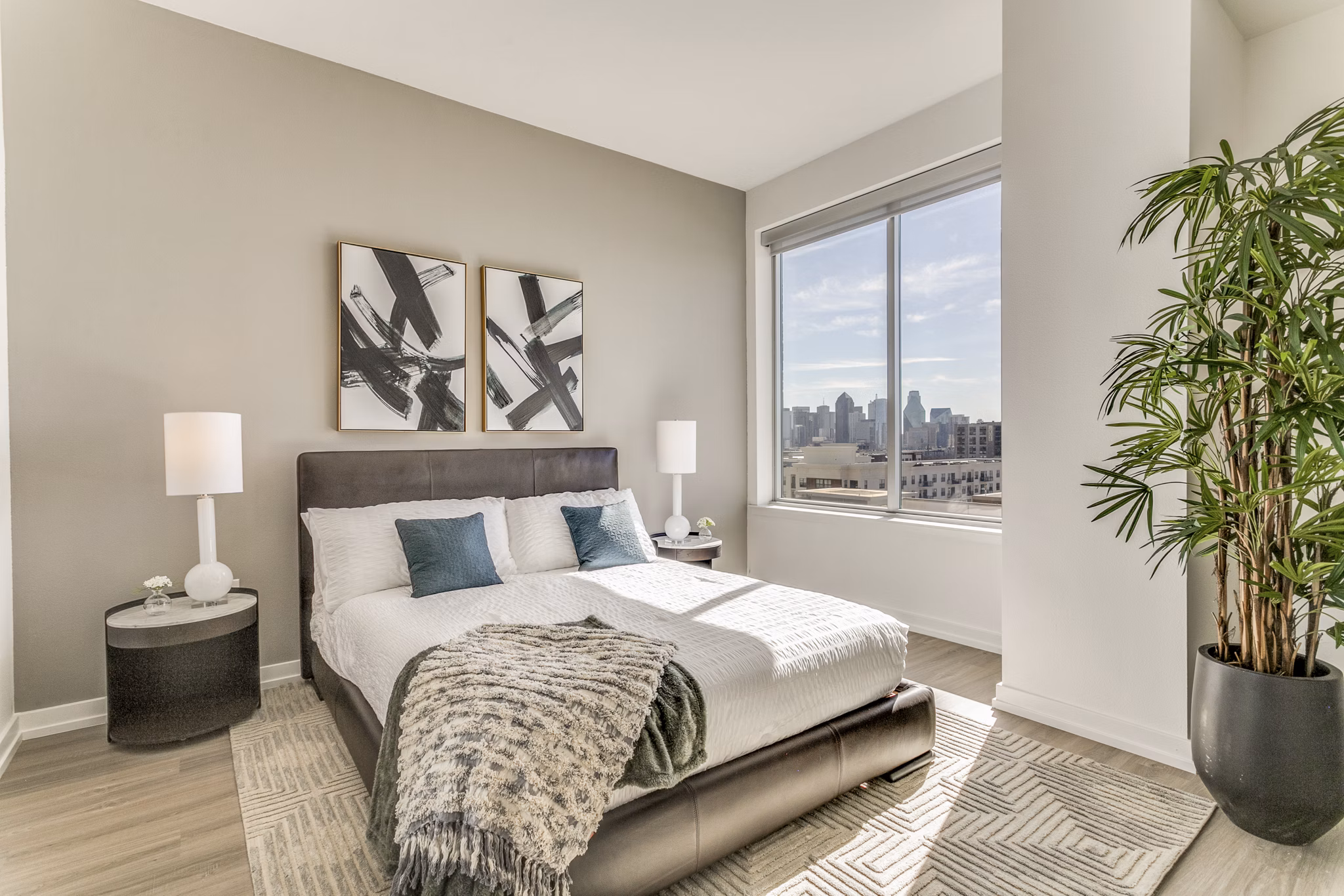 Spacious bedroom with modern decor at 3700M Apartments in the heart of the city