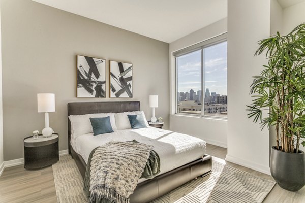 Spacious bedroom with modern decor at 3700M Apartments in the heart of the city