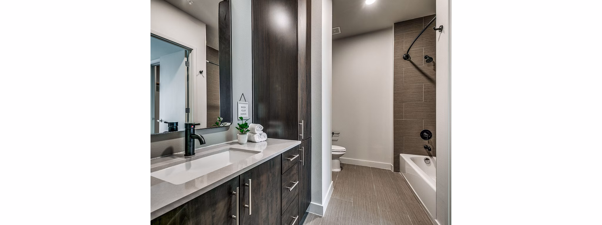 Modern bathroom with sleek fixtures at 3700M Apartments, a Greystar luxury property in a prime urban location