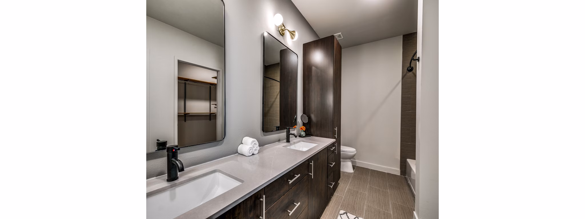 Luxury bathroom with sleek fixtures at 3700M Apartments, showcasing modern design and comfort in urban living