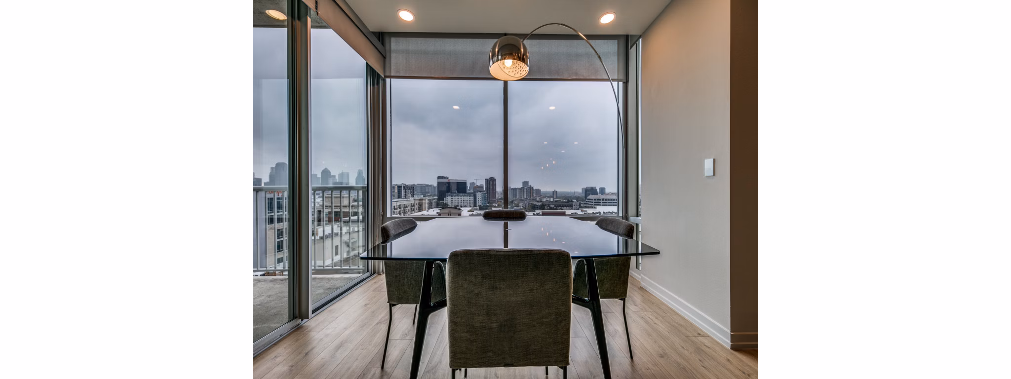 Dining area with sleek modern furniture at 3700M Apartments, a luxury Greystar community in the heart of the city