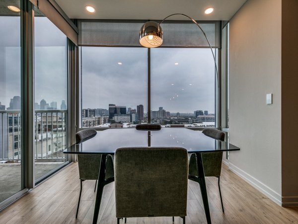 Dining area with sleek modern furniture at 3700M Apartments, a luxury Greystar community in the heart of the city