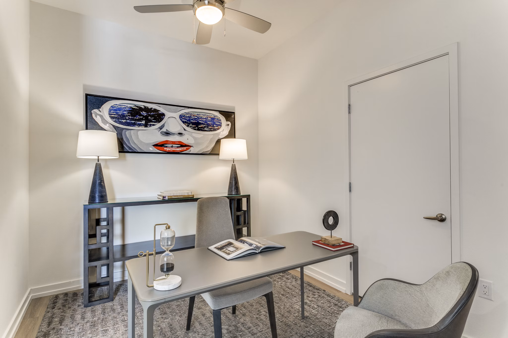 Home office with modern furnishings at 3700M Apartments in vibrant downtown setting