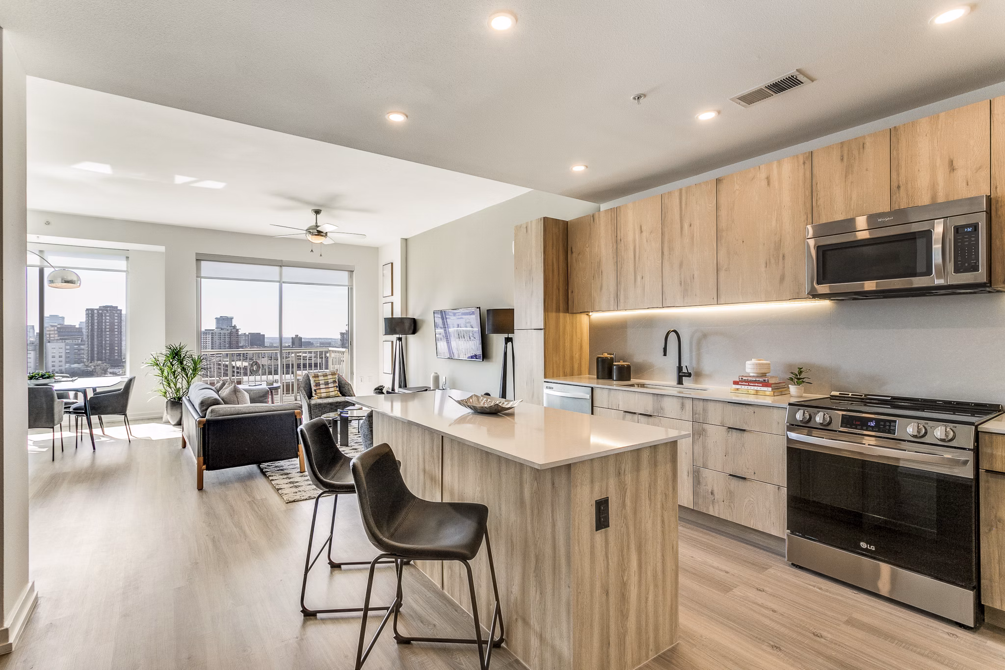 Modern kitchen with sleek cabinetry and stainless steel appliances at 3700M Apartments in Dallas