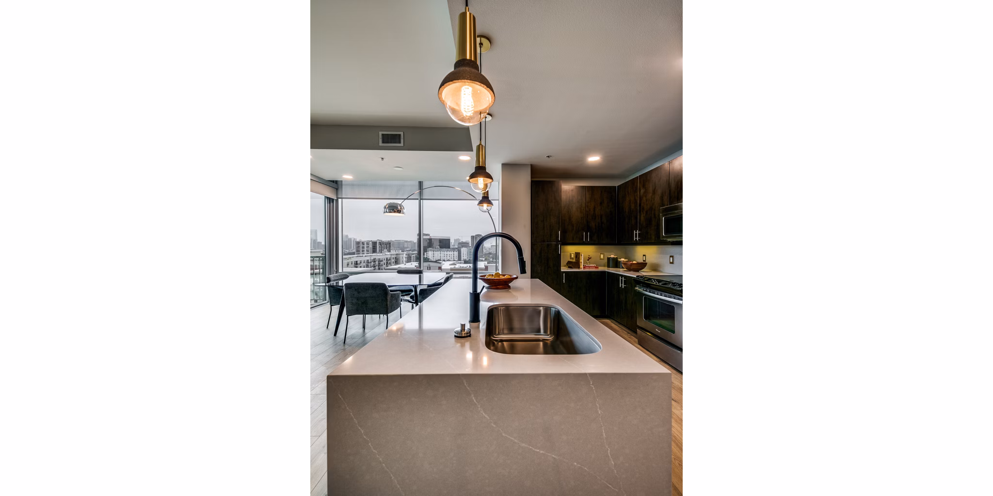 Modern kitchen featuring stainless steel appliances at 3700M Apartments