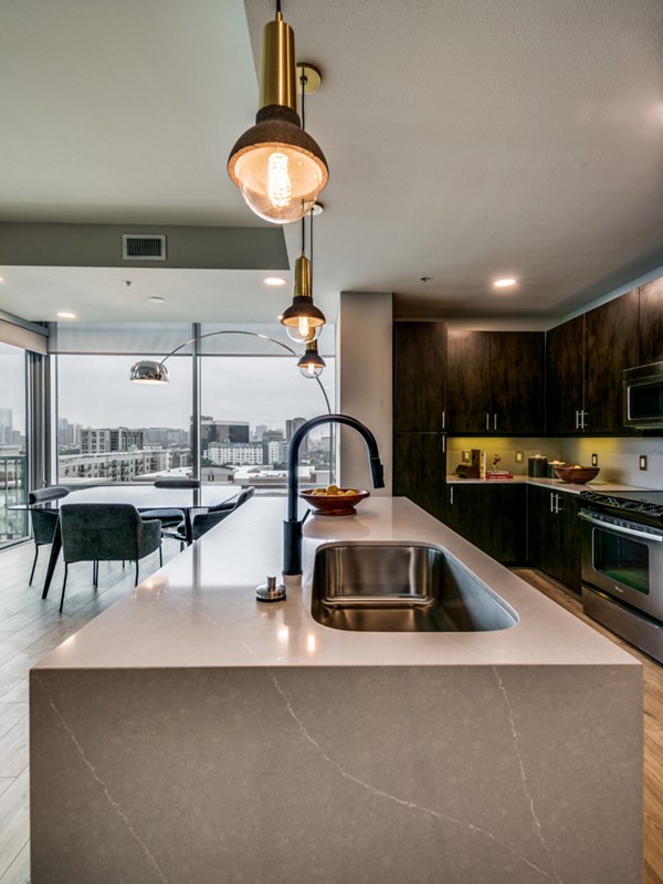 Modern kitchen featuring stainless steel appliances at 3700M Apartments