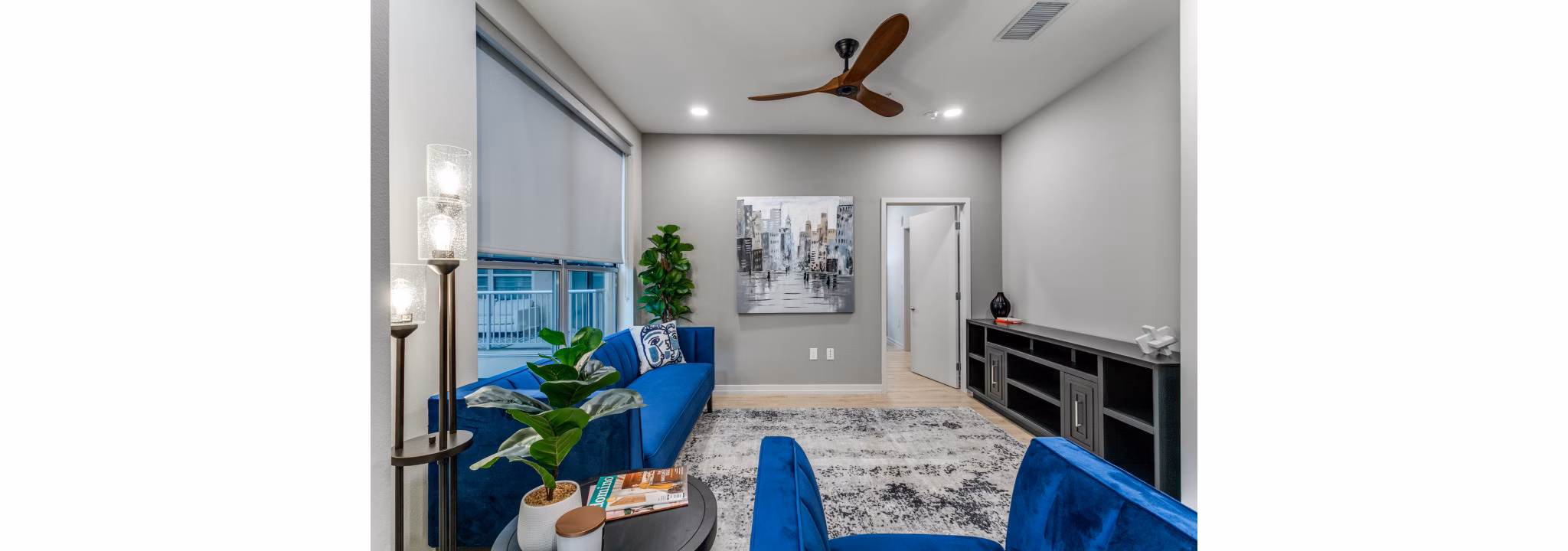 Spacious living room with contemporary furnishings at 3700M Apartments, offering luxury living in an urban setting