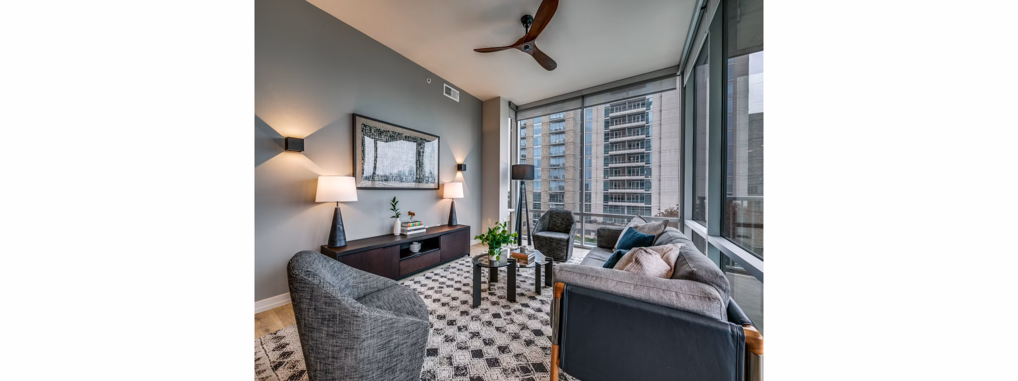 Contemporary living room with modern decor at 3700M Apartments in Dallas by Greystar