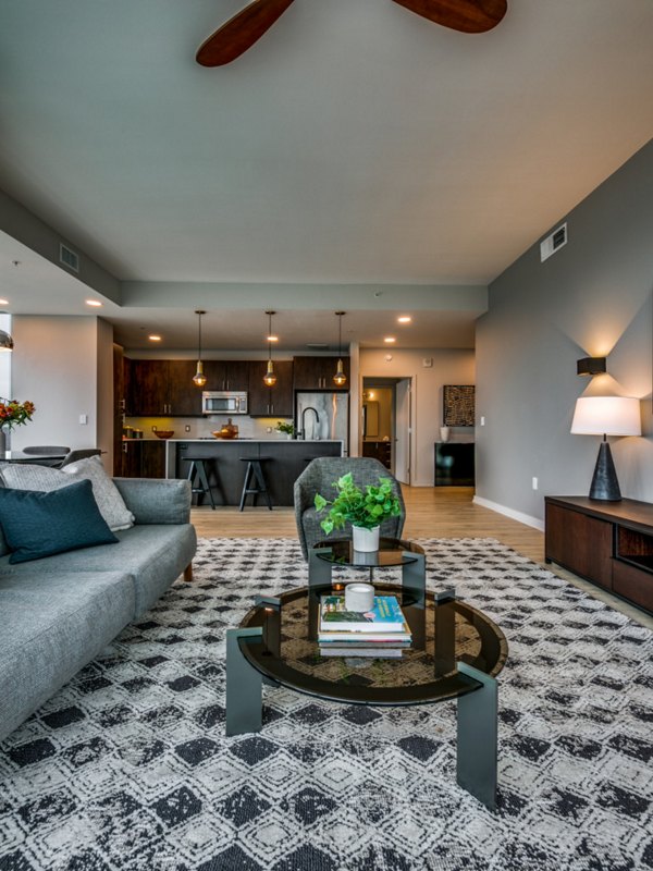 Living room with contemporary decor featuring elegant furniture at 3700M Apartments
