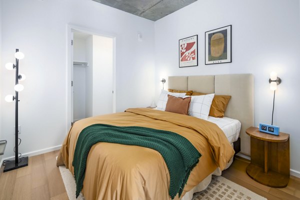 Bedroom featuring contemporary furnishings at 1111 Church Apartments in Nashville