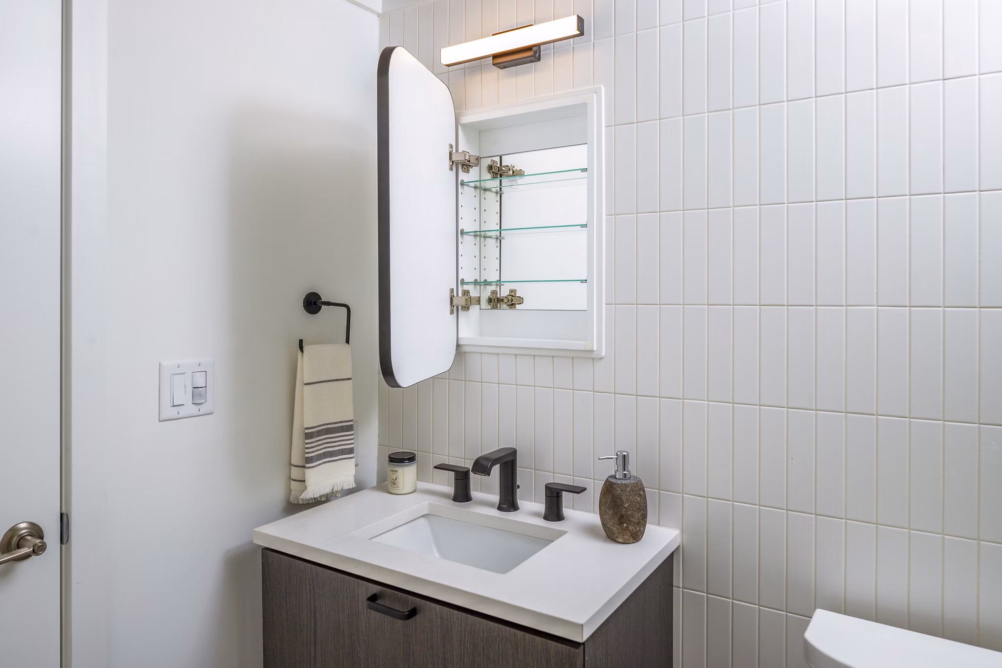 Luxurious bathroom with marble countertops and modern fixtures in 1111 Church Apartments Perfect for Greystar luxury apartment living