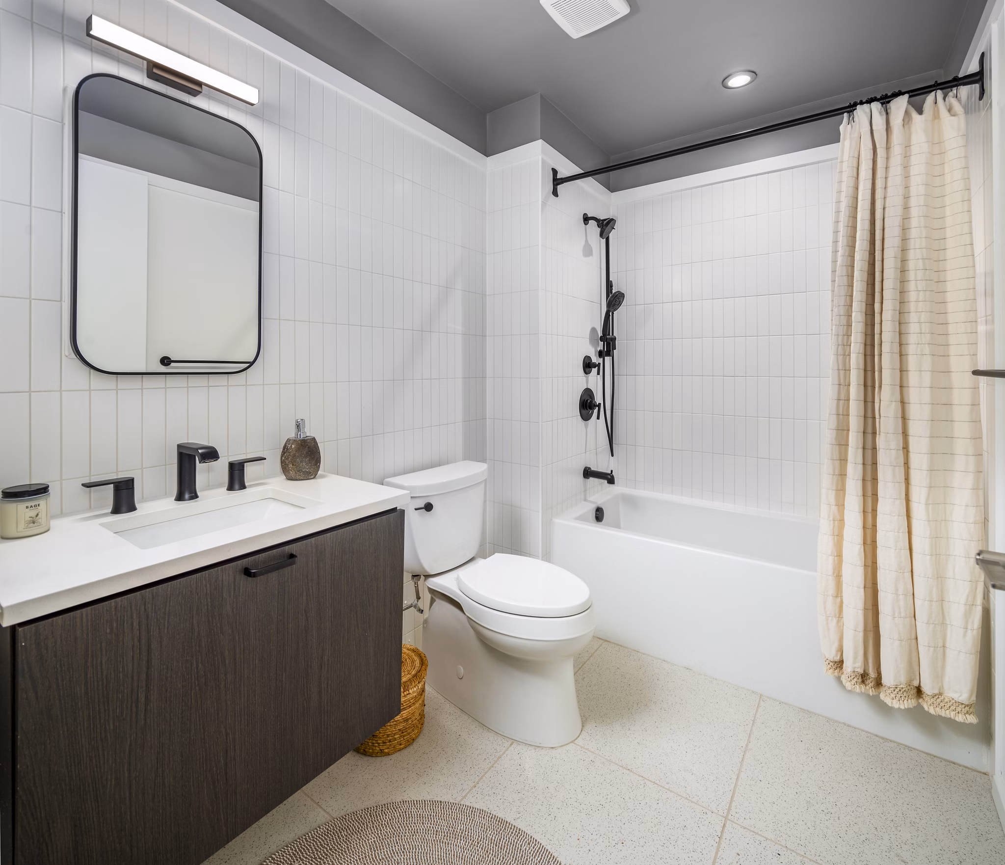Luxurious bathroom featuring elegant marble countertops at 1111 Church Apartments