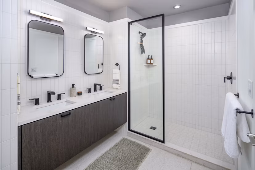 Bathroom with sleek fixtures and modern design at 1111 Church Apartments