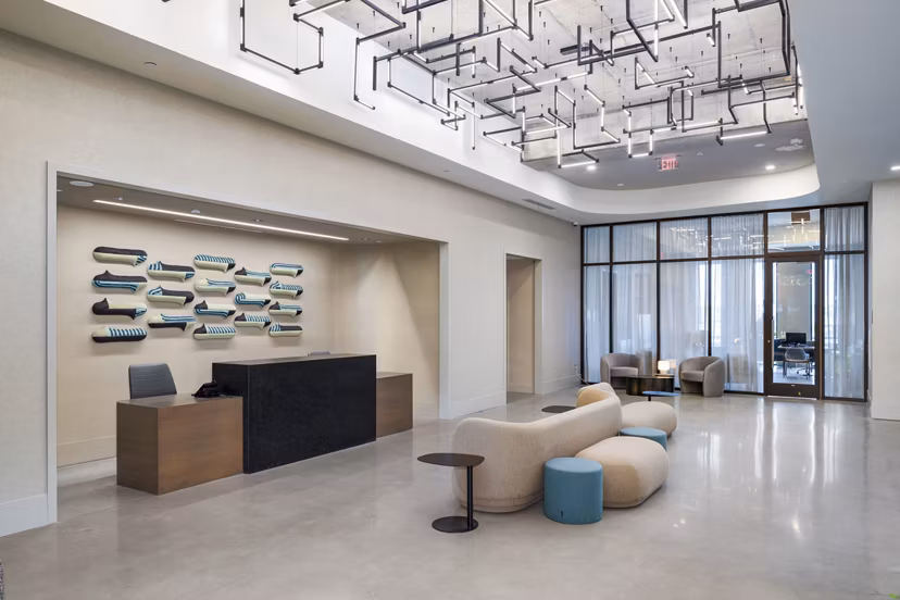 Clubhouse with stylish seating and modern decor at 1111 Church Apartments