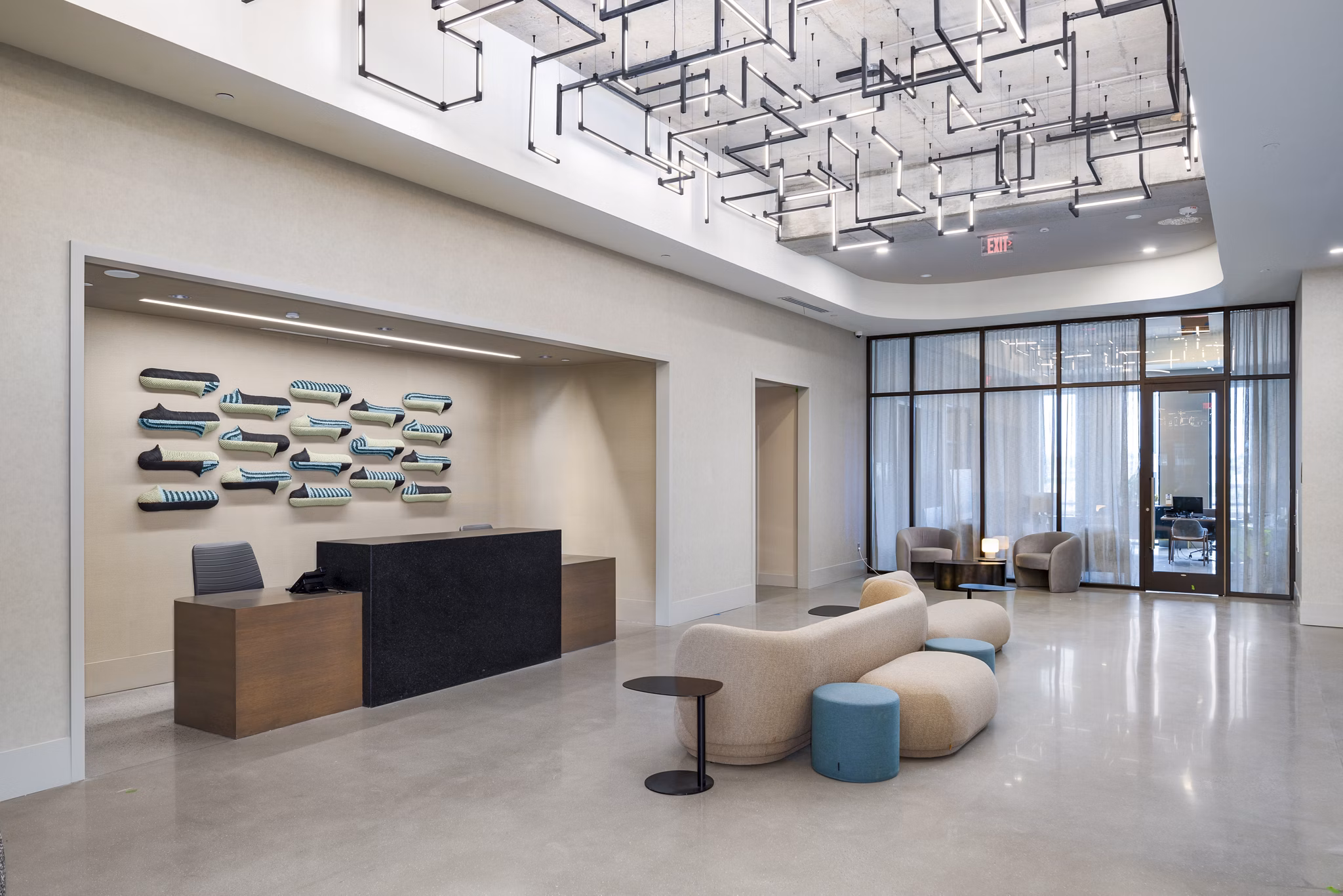 Clubhouse with stylish seating and modern decor at 1111 Church Apartments