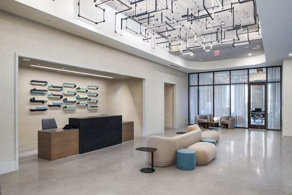 Clubhouse with stylish seating and modern decor at 1111 Church Apartments
