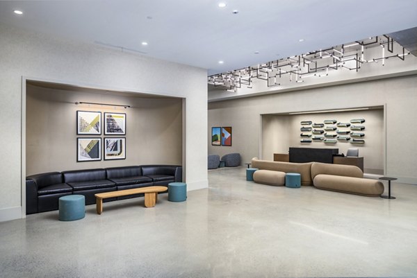 Clubhouse lounge with modern decor at 1111 Church Apartments, perfect for gatherings and relaxation