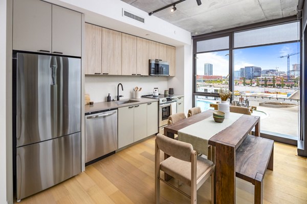 Elegant dining room with modern furnishings at 1111 Church Apartments, showcasing luxury living spaces