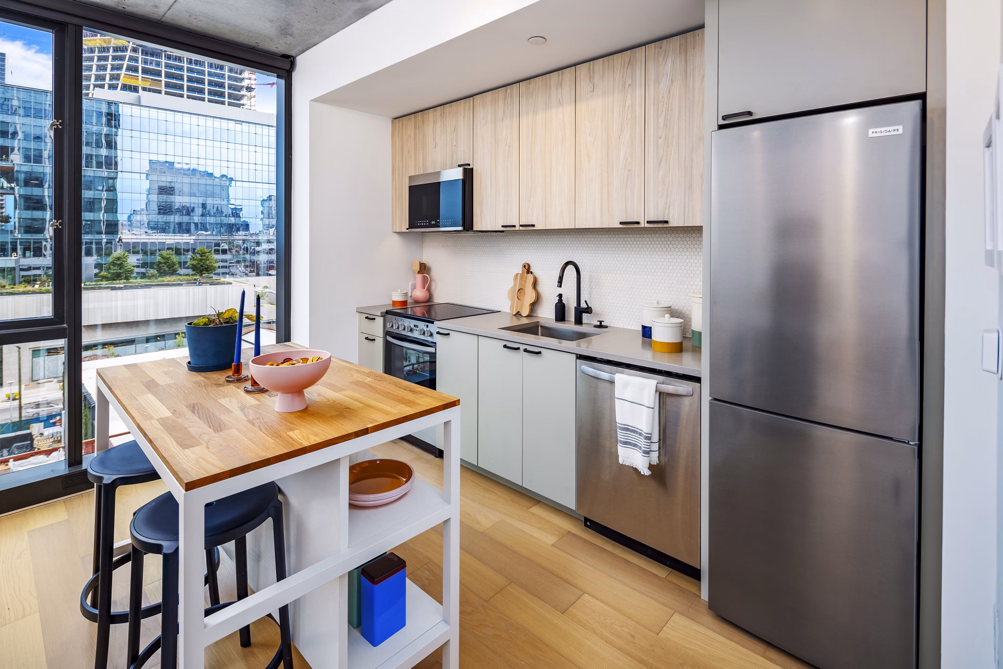 Sleek modern kitchen with stainless steel appliances at 1111 Church Apartments, a Greystar luxury community in downtown