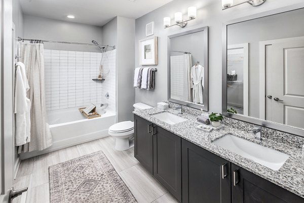 Bathroom featuring modern fixtures at Elan Sweetwater Creek Apartments