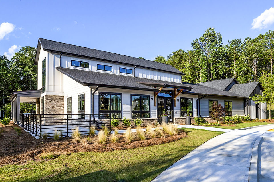 Clubhouse with modern design elements at Elan Sweetwater Creek Apartments, a luxury community with vibrant social spaces and amenities