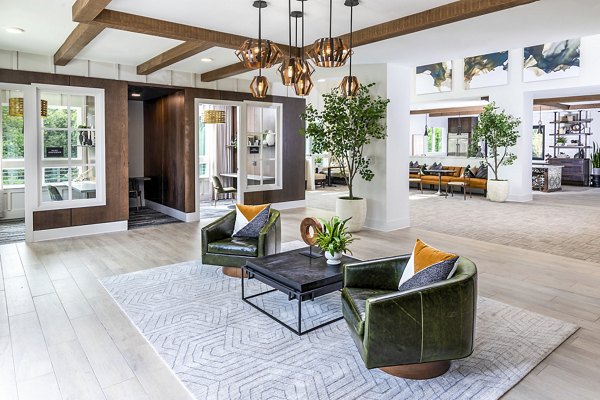 Contemporary clubhouse lobby with stylish seating at Elan Sweetwater Creek Apartments