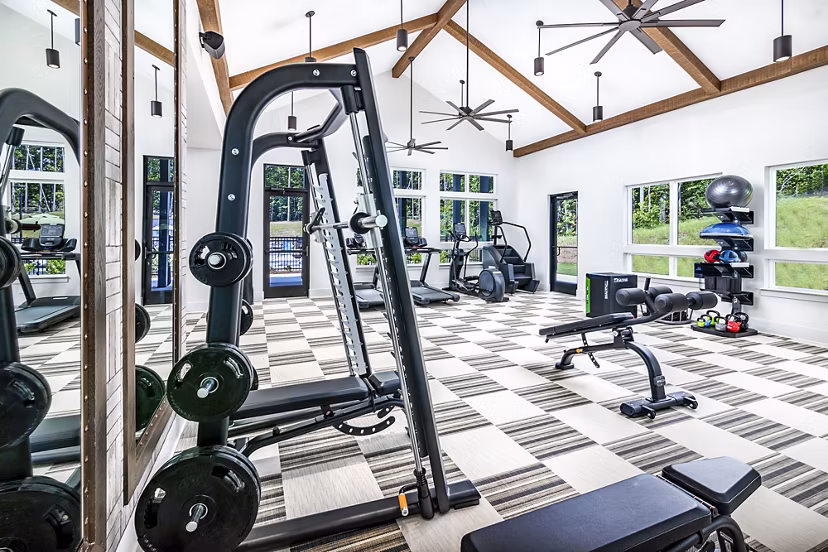 Modern fitness center with state-of-the-art equipment at Elan Sweetwater Creek Apartments, enhancing resident wellness and lifestyle