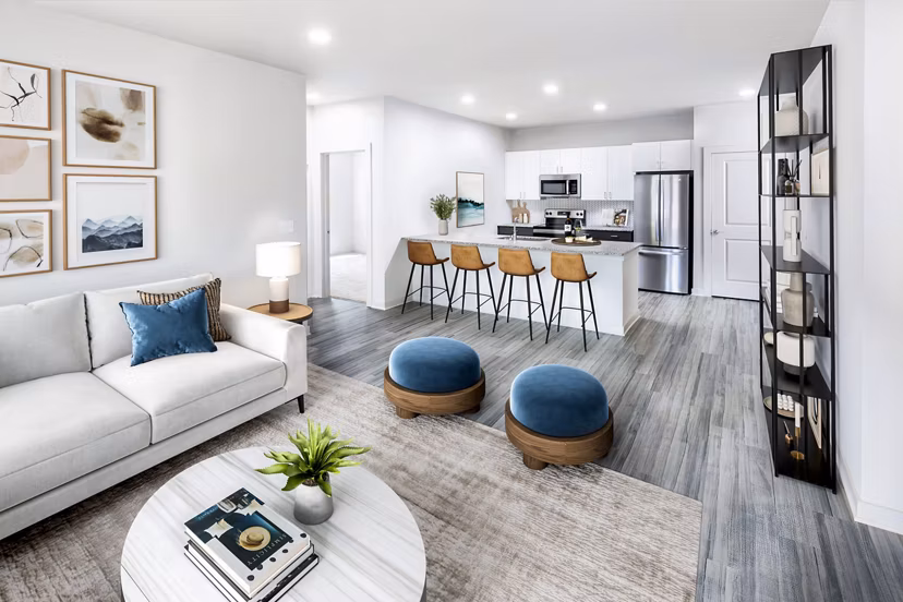 Spacious living room with modern furnishings at Elan Sweetwater Creek apartments