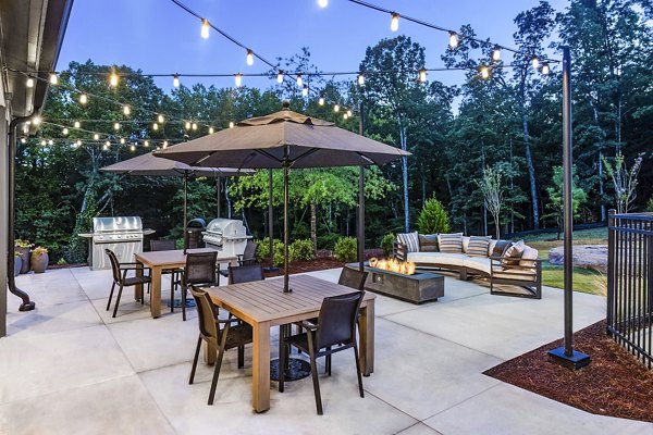 fire pit/grill area/patio at Elan Sweetwater Creek Apartments