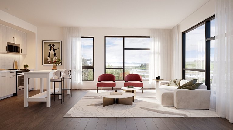 Modern apartment living room with large windows, plush red chairs, and a framed dog portrait.