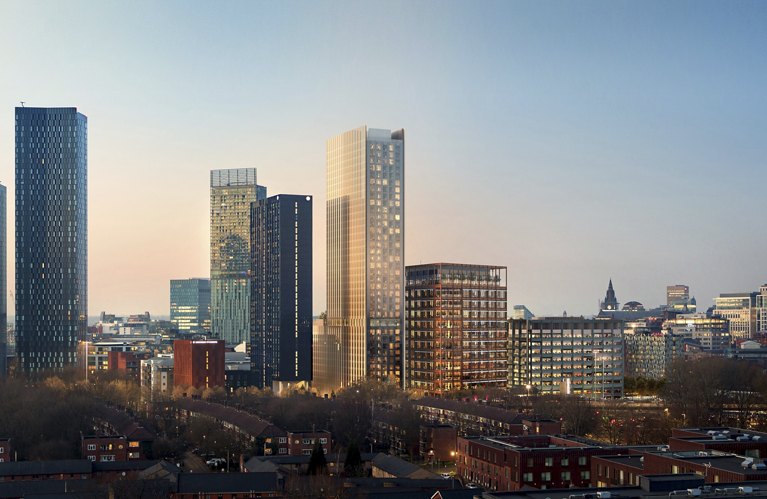 Cityscape of Manchester with blue sky and city below