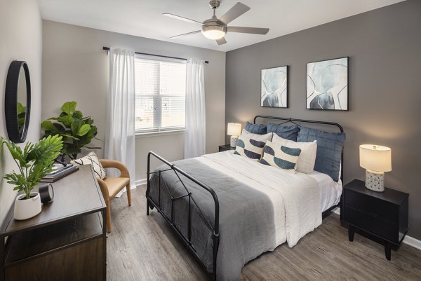 Modern bedroom featuring cozy design elements at Prose New Hope Apartments, a Greystar community focused on luxury and comfort