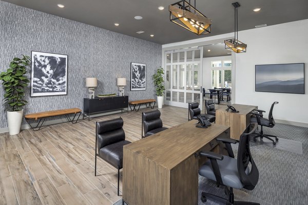 Modern clubhouse with social lounge and fitness center at Prose New Hope Apartments