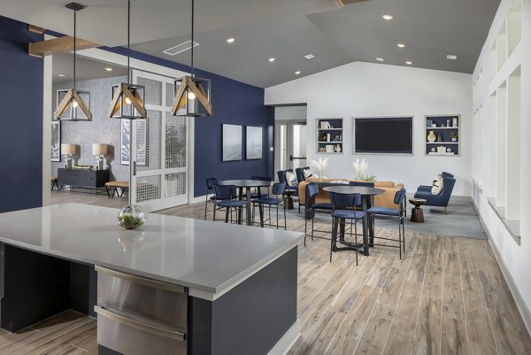 Clubhouse with modern seating and entertainment options at Prose New Hope Apartments