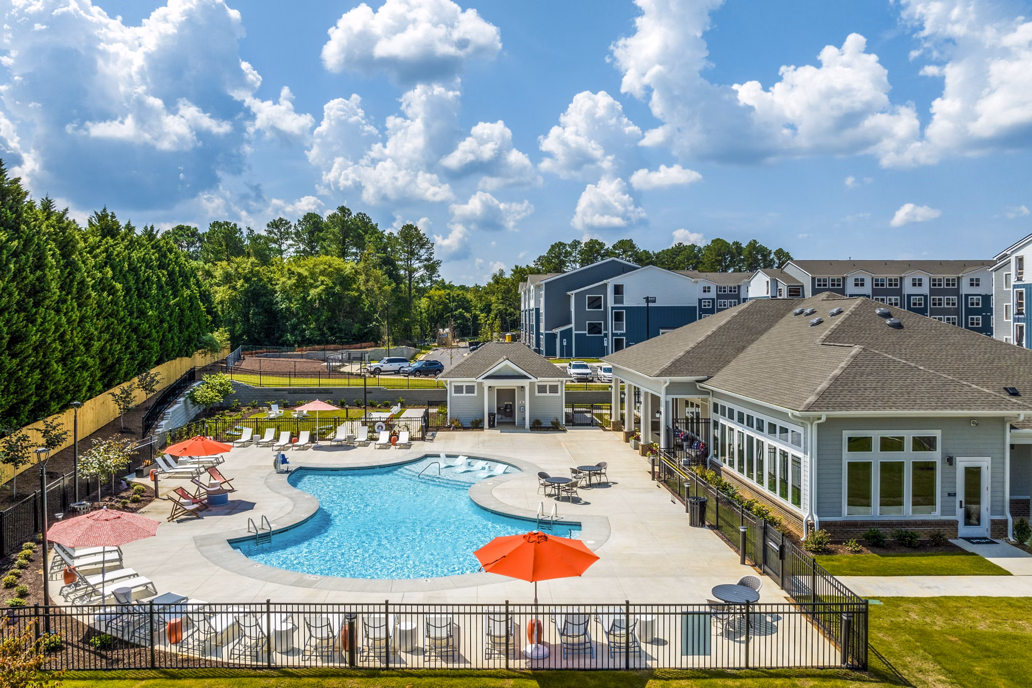 Sparkling outdoor pool at Prose New Hope Apartments, a luxury feature offering resort-style relaxation and leisure