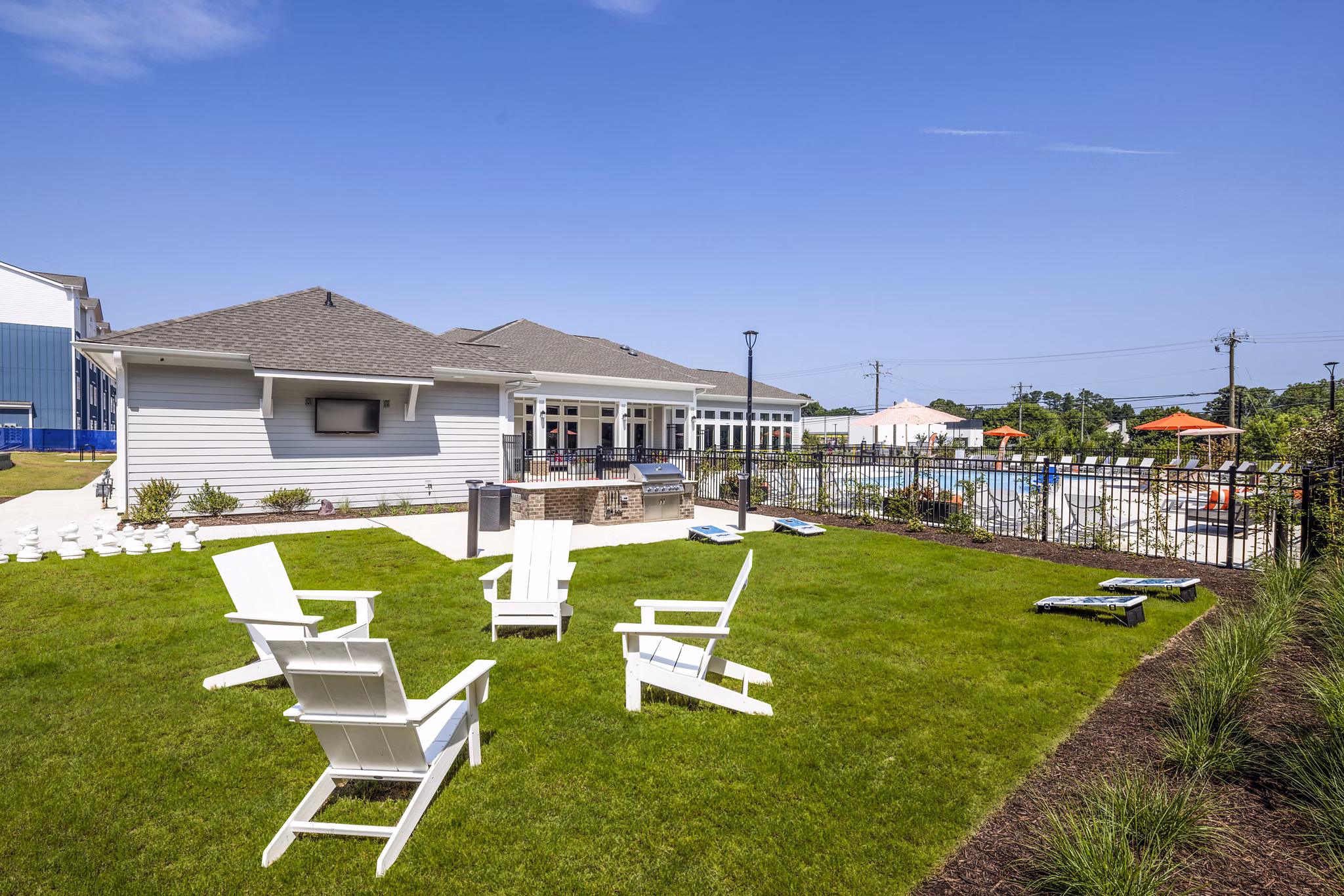 Modern recreational area with plush seating and games in Prose New Hope Apartments