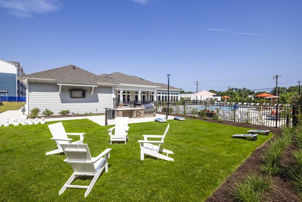 Modern recreational area with plush seating and games in Prose New Hope Apartments