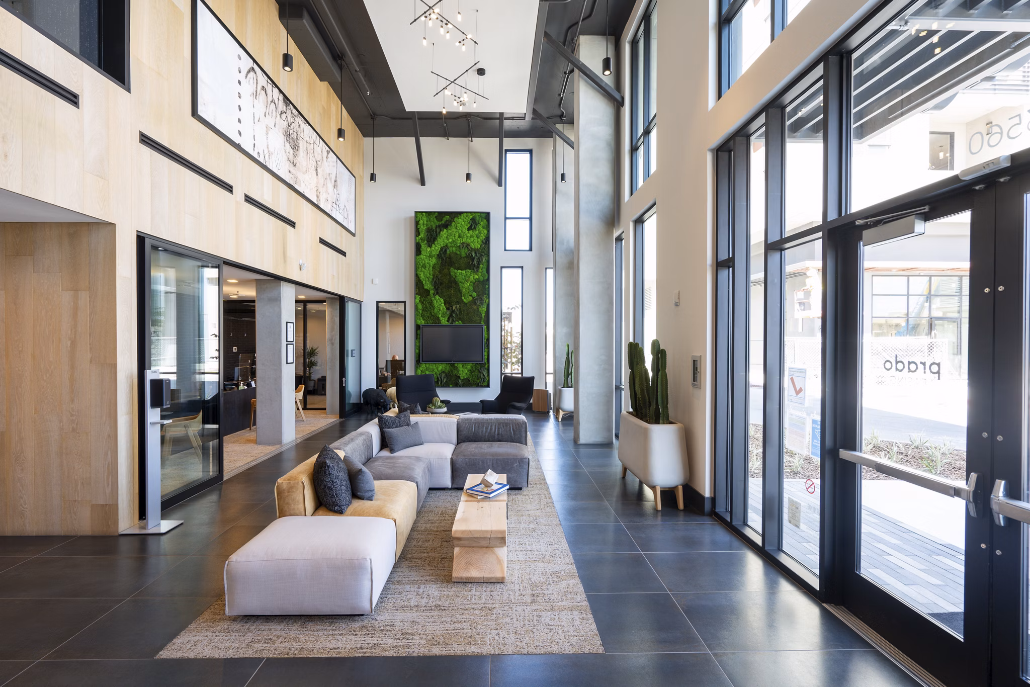 Spacious clubhouse with modern interiors at Prado Apartments, offering luxury amenities in a welcoming environment