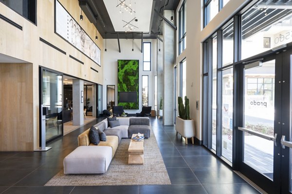 Spacious clubhouse with modern interiors at Prado Apartments, offering luxury amenities in a welcoming environment