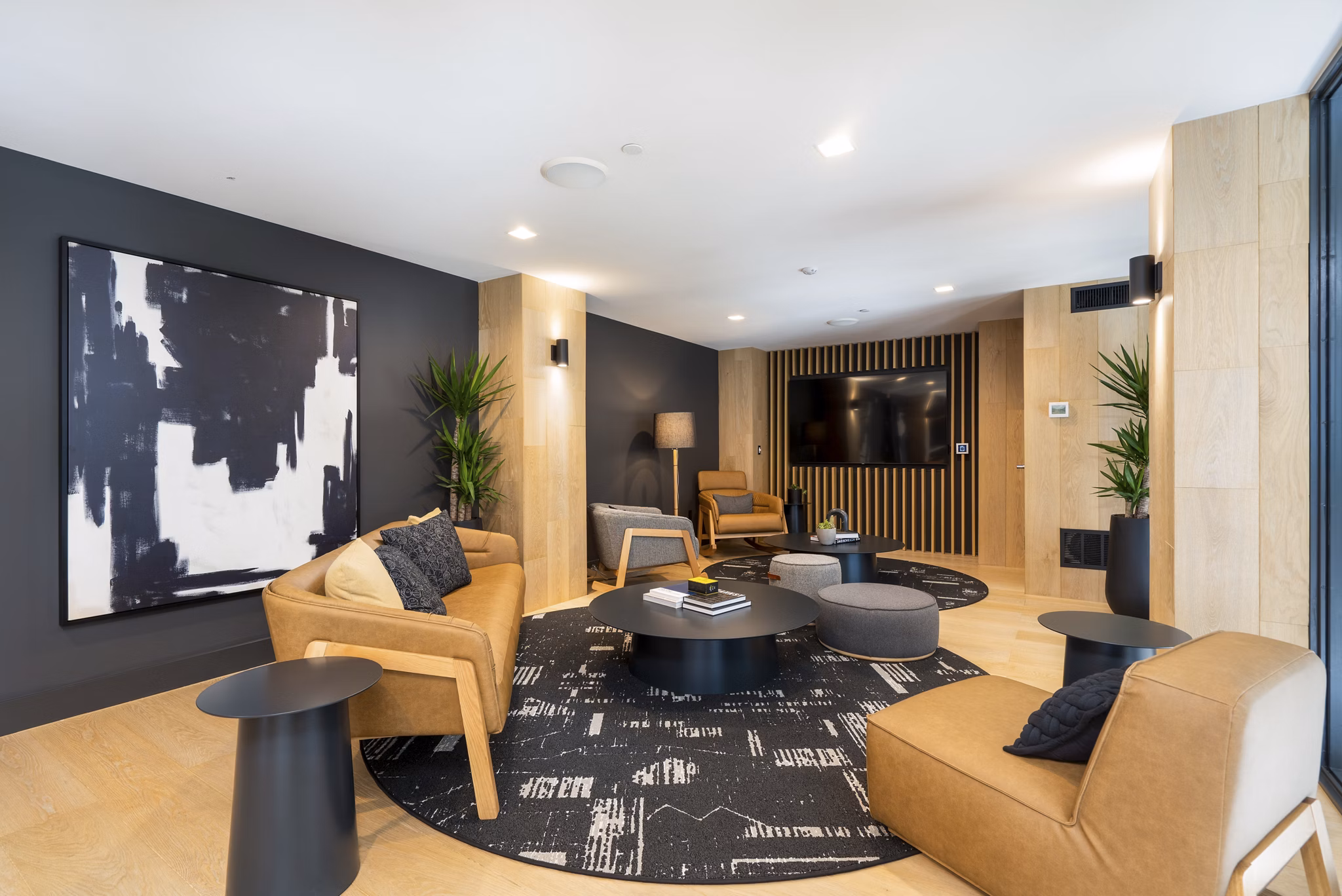 Prado Apartments: Modern clubhouse with stylish seating and fireplace in Atlanta luxury apartments