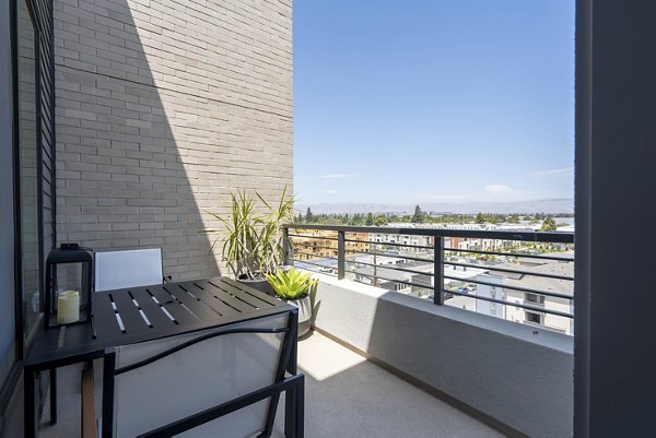 Modern patio with stylish seating at Prado Apartments, a Greystar luxury community in a vibrant location