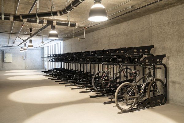 Spacious bike storage at Prado Apartments, offering secure and convenient bicycle parking for residents