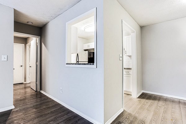 Modern kitchen with stainless steel appliances at Hairston Woods Apartments