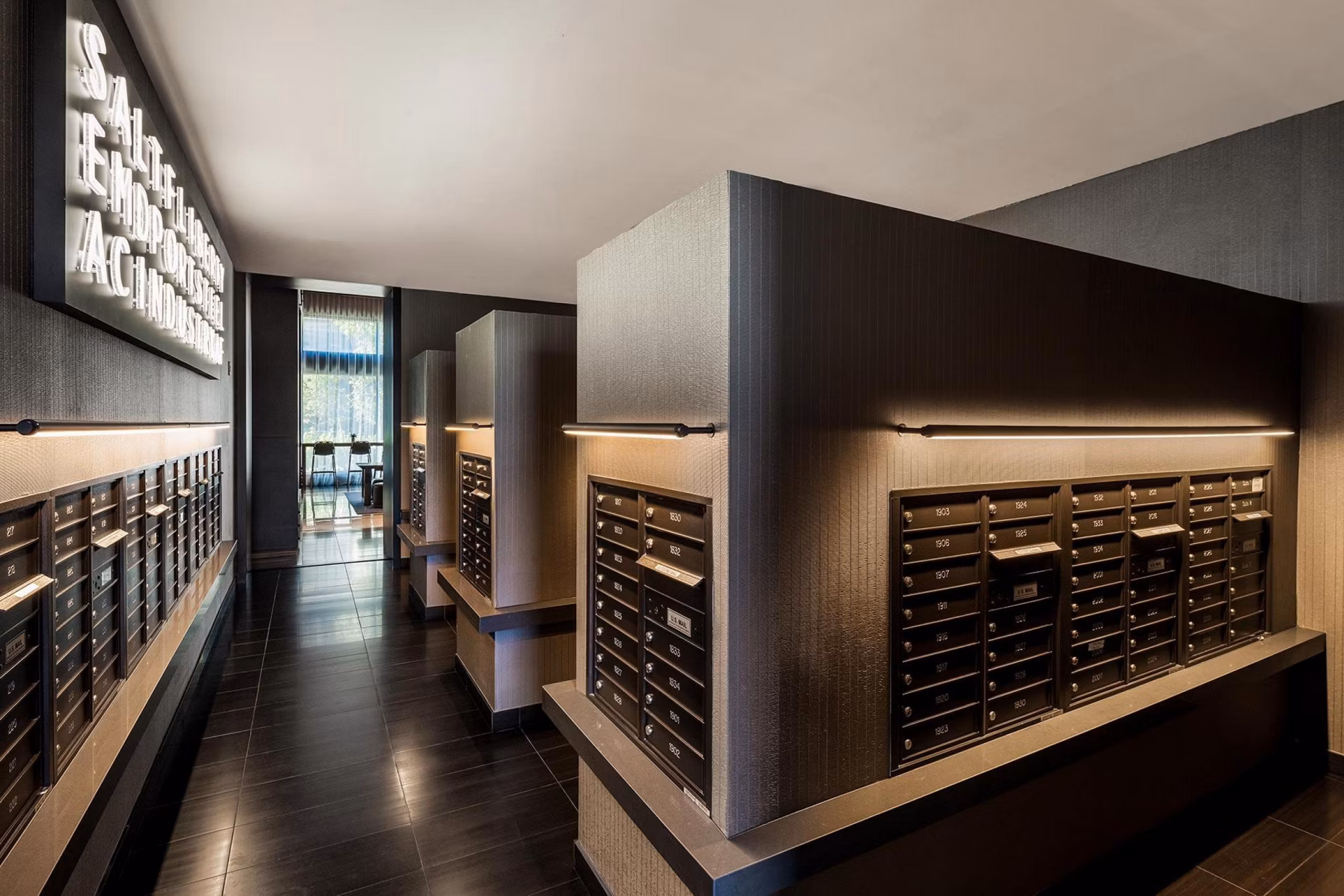 Modern mail room with secure lockers at The Metlo Apartments