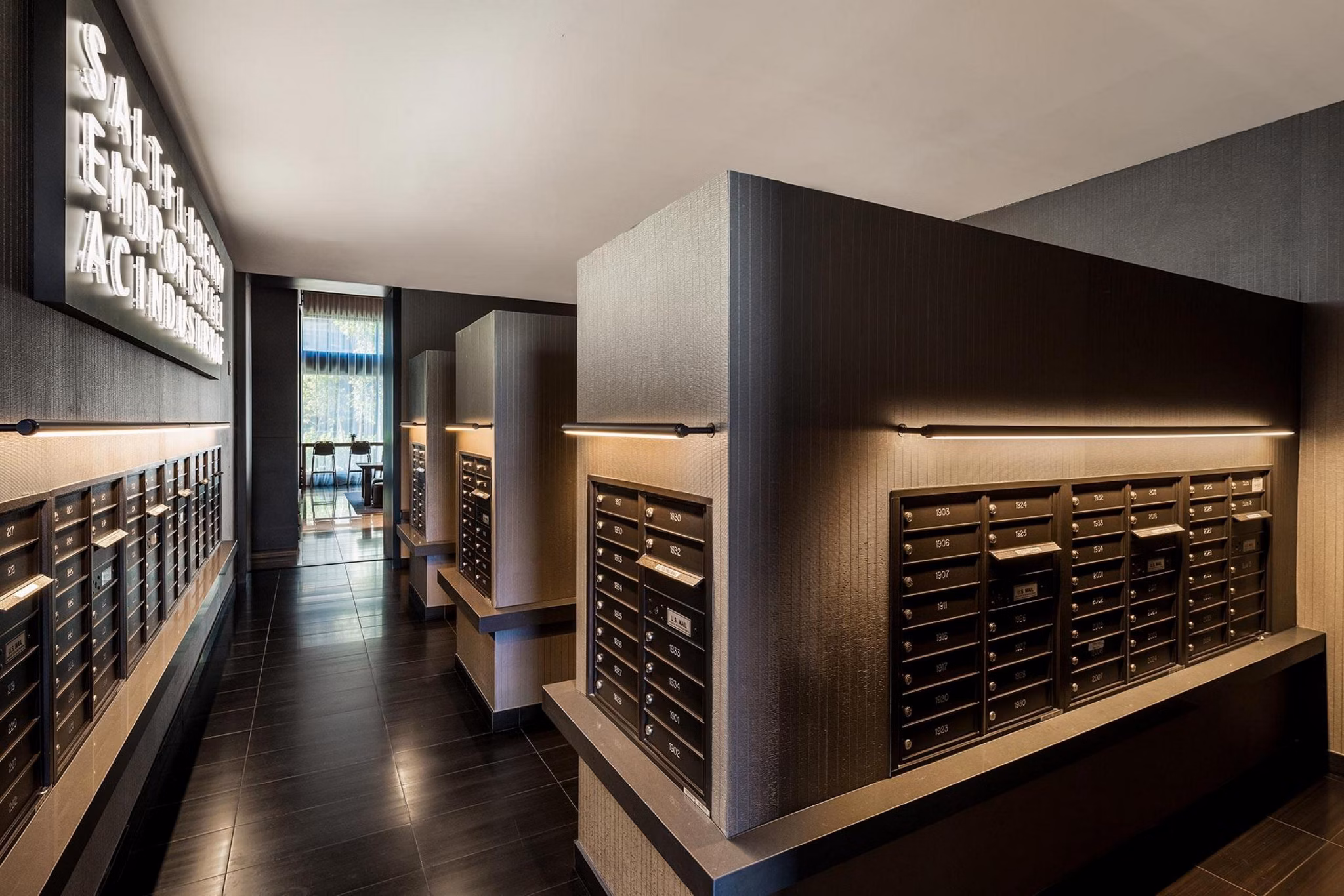 Modern mail room with secure lockers at The Metlo Apartments
